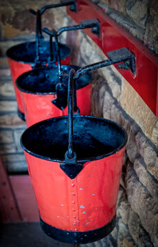 Row of red fire buckets