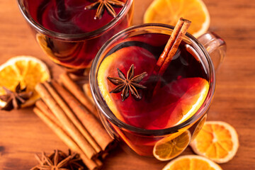 German tradition winter Christmas market new year holidays festival drink tea Gluhwein Mulled sweet hot warm red Wine with spices citrus aromatic cinnamon star anise