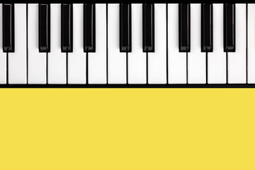 Synthesizer keyboard in trendy yellow color 2021
