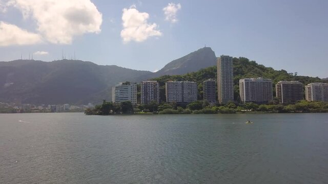 drone flight near Lagoa Area  in Rio de Janeiro south zone distant view of crist