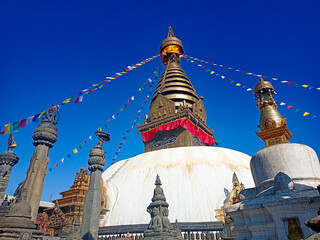 stupa in kathmandu ,This is the famous Swayambunath temple or monkey temple with beautiful blue sky and stupa located at the capital city of Nepal ,kathmandu ,