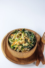 Urap sayur is traditional salad from Indonesia. It is boiled vegetables with spicy grated stir-fried coconut.
