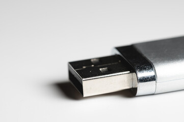 Close-up USB flash drive. Close-up on gray gradient background