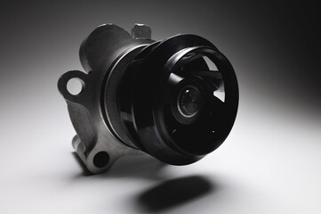 ICE liquid cooling pump. Engine coolant pump. Contrast light on gray background