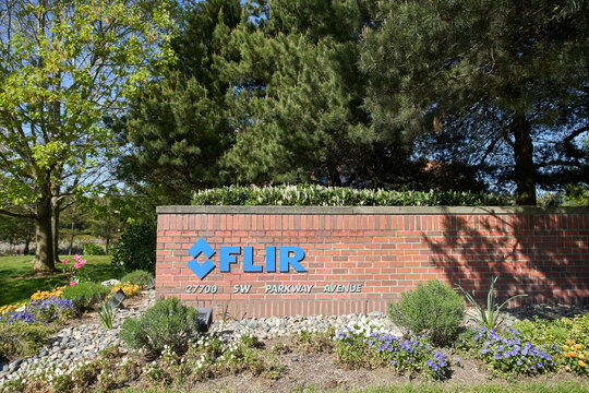 Wilsonville, Oregon - Apr 28, 2019: The FLIR sign at FLIR Systems Headquarters. The company specializes in the design and production of thermal imaging cameras, components and imaging sensors.