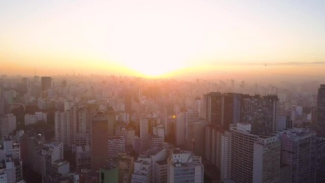 flight over some buildings City centre Of Sao Paulo, near republica at sunset