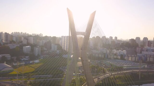 drone flight at sunset  over estaiada bridge in S&atilde;o Paulo during a sunset on a busy day