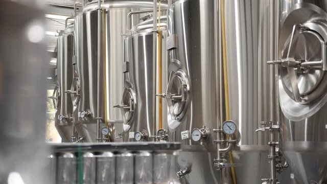 Beer tanks close up dynamic pan