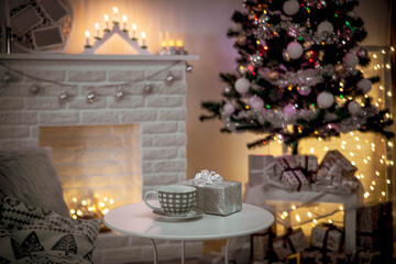 Cosy interior with a fireplace decorated in Christmas style