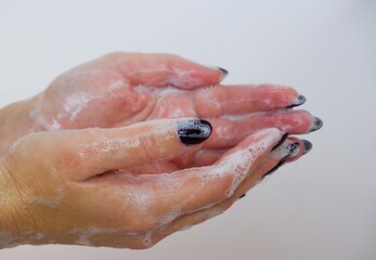 Fototapeta premium Hygiene concept. Washing hands with soap