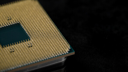 Powerful central processing unit presented in macro. Contact feet are gold plated for less...