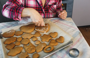 A traditionalist concept. decoration of freshly baked Christmas cookies. handmade holiday sweets close-up.Making festive handmade Christmas candies for gifts