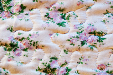 Background texture. cotton, fabric. The color is pink-white. Small flowers.
