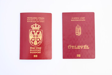 Serbian and Hungarian passport on white background