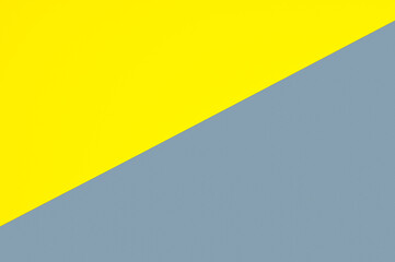 Demonstrating trendy colors 2021 - Gray and Yellow. Paper geometric background with copy space.