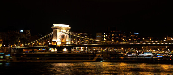 Fototapeta na wymiar View of the Szechenyi Bridge at night in Budapest, Hungary.