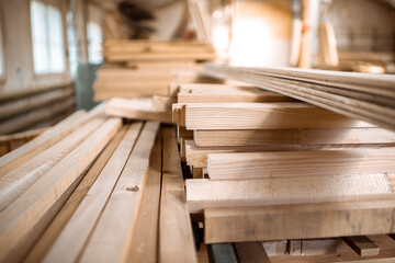 Pile of pine planks at the warehouse