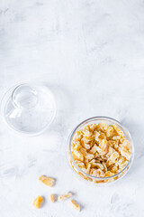 Homemade dried candied zucchini on a light background. Candied vegetables. Vegetarian sweets. Сopy space