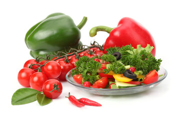 Tomato, cucumber, olives, parsley in salad close-up.