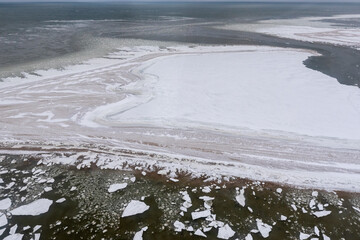 Textured background view of arctic ocean in northern Manitoba, Canada, before the ie has fully frozen for the winter on Hudson Bay.