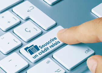Souscrire un crédit relais - Inscription sur la touche du clavier bleu.