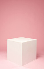 Obraz premium White cube on the pink background. White platform for objects.