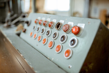 Control panel of an old woodworking machine at the joinery