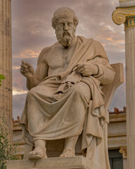 Fototapeta premium Plato the ancient Greek philosopher statue under dramatic sky, Athens Greece