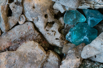 Rock stones and blue crystals, background, texture. Concept, top view