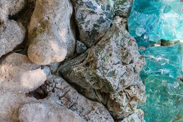 Rock stones and blue crystals, background, texture. Concept, top view