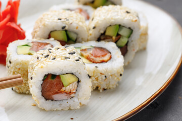 Japanese sushi roll on plate close up