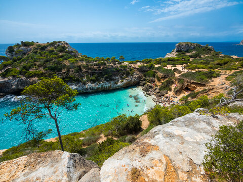 Spain, Mallorca, Santanyi, Turquoise Bay Of Calo Des Moro Beach In Summer