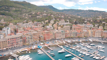 Obraz premium aerial view of municipality Santa Margherita Ligure in summer day, white yachts are moored in small bay