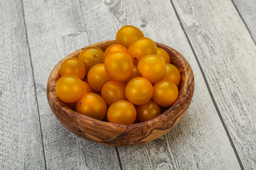 Fresh yellow cherry tomato heap