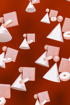Geometric shapes hovering against red background