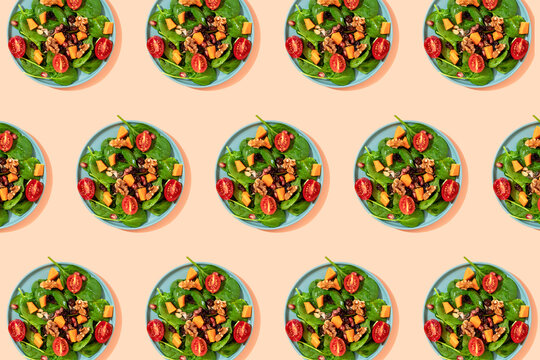 Pattern of plates of fresh ready-to-eat vegan salad