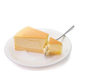 The close up of sliced yummy cheesecake bakery sweet dessert isolated on white background.