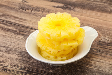 Sweet pineapple rings in the bowl