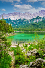 Eibsee lake with Zugspitze mountain in the background. Beautiful landscape scenery with paradise...