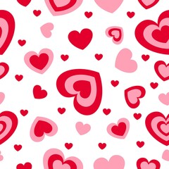 St Valentine’s Day. Seamless pattern with red and pink hearts. White background. Decorative ornament. Love and romance. Template for post cards, wallpaper, textile, scrapbooking and wrapping paper