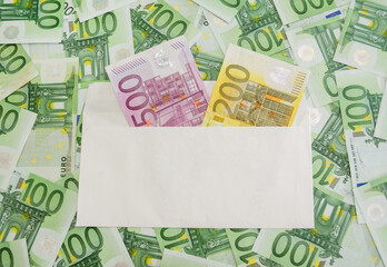 200 and 500 euros in a white envelope
