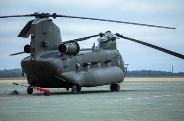 Fototapeta na wymiar Military heavy lift helicopter waiting on the dispersal area