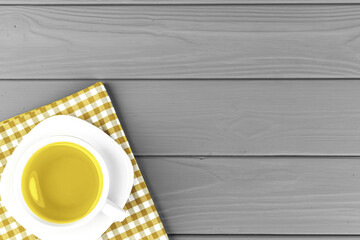 Top view of a cup of coffee on saucer on classic blue background