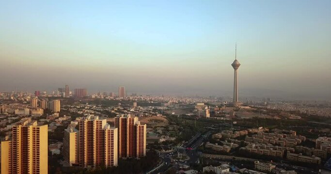 Milad Tower Tehran Iran And Block Buildings In Sunset Time Landscape Of Blue Sky Above Air Pollution
Urban City Life Concept And Air Pollution In Big City Architecture Houses Cars Driving In Highway