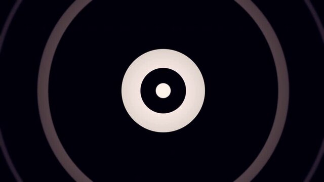 Optical art monochromatic 4k animation of concentric white circles getting bigger on black background. Seamless loop.