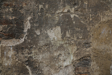 Beautiful  and cracked cement wall with structure, wall grey, brown and rough, empty with space on the background