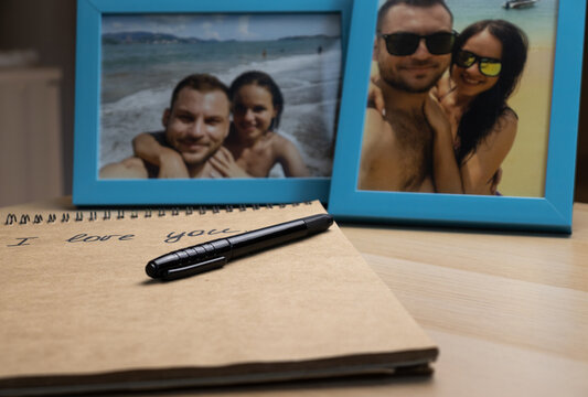 Photo frames with happy young couple and love letter with text I love you. 