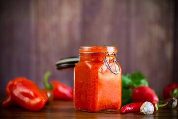 fresh natural homemade sauce made of peppers, tomatoes and other vegetables