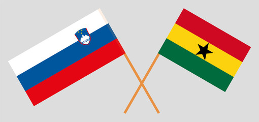 Crossed flags of Ghana and Slovenia. Official colors. Correct proportion