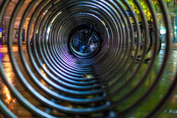 modern bicycle stand in a night city